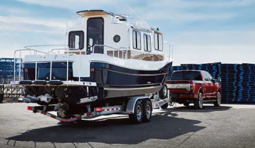 2022 Nissan TITAN Truck towing boat | Horace Nissan in Farmington NM